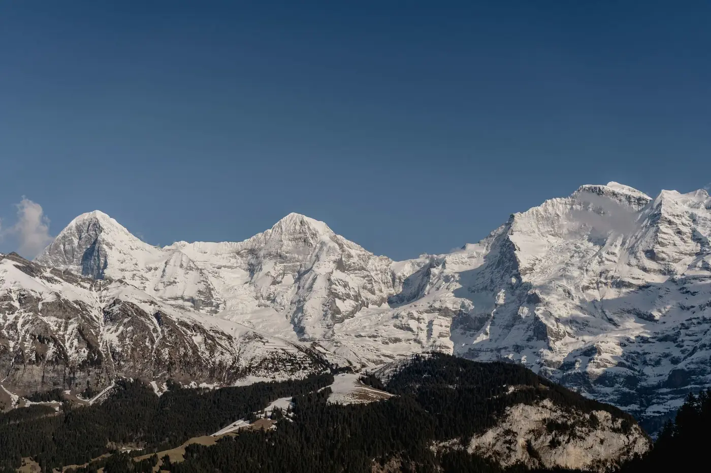 Majestic view of snow-covered Swiss Alps in Lauterbrunnen, a natural wonder in Switzerland.