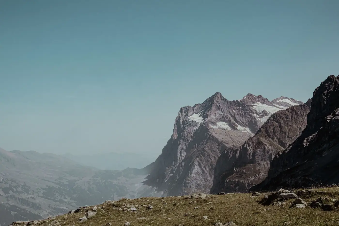 Breathtaking mountain landscape of Grindelwald, Switzerland with clear skies.